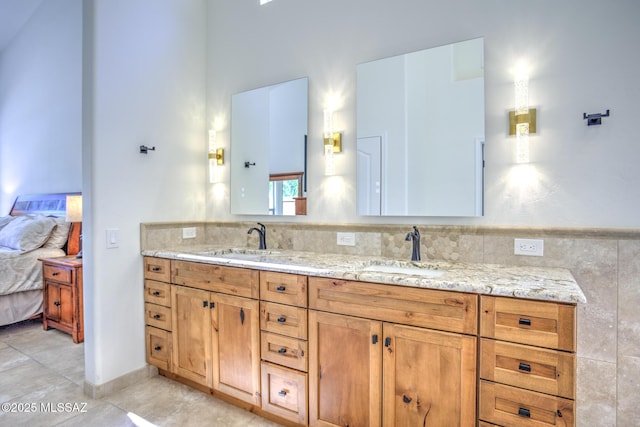 218 W Milbrae Springs Dr, Oro Valley, AZ 85755 - full bathroom with double vanity, tile patterned floors, ensuite bath, and a high ceiling