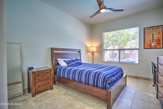 218 W Milbrae Springs Dr, Oro Valley, AZ 85755 - bedroom featuring a ceiling fan and baseboards