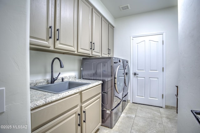 218 W Milbrae Springs Dr, Oro Valley, AZ 85755 - washroom with washing machine and clothes dryer, cabinet space, and light tile patterned floors