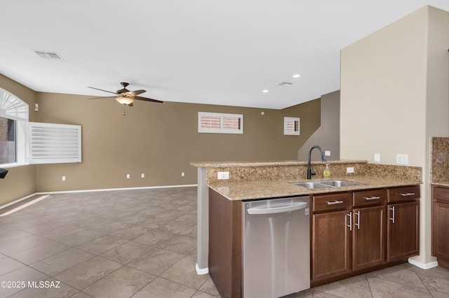2247 W Night Air Ln, Tucson, AZ 85741 - kitchen with dishwasher, a sink, a ceiling fan, a peninsula, and light tile patterned floors