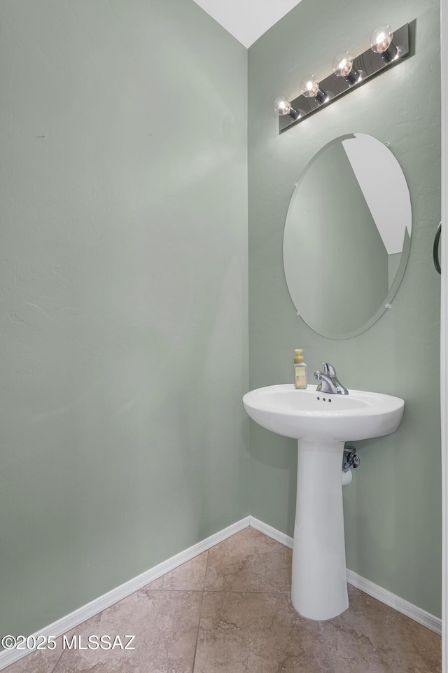 2247 W Night Air Ln, Tucson, AZ 85741 - bathroom with baseboards and tile patterned floors