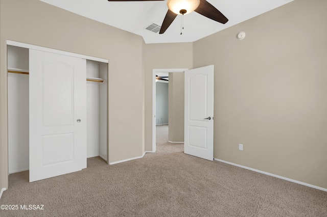 2247 W Night Air Ln, Tucson, AZ 85741 - unfurnished bedroom featuring carpet, a closet, baseboards, and ceiling fan