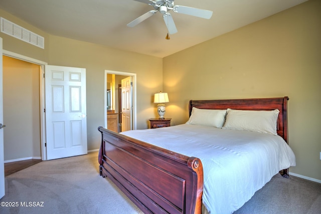 11113 N Rams Horn Trl N, Oro Valley, AZ 85737 - bedroom with carpet flooring, baseboards, ceiling fan, and ensuite bath