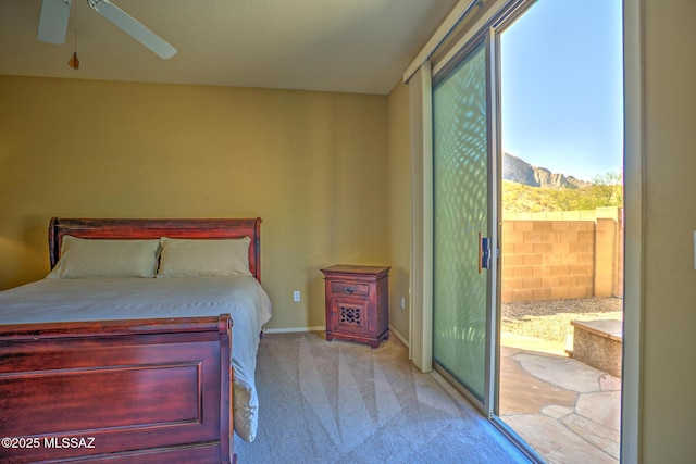11113 N Rams Horn Trl N, Oro Valley, AZ 85737 - bedroom with carpet flooring, access to exterior, baseboards, and ceiling fan