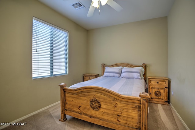 11113 N Rams Horn Trl N, Oro Valley, AZ 85737 - carpeted bedroom with multiple windows, baseboards, and a ceiling fan