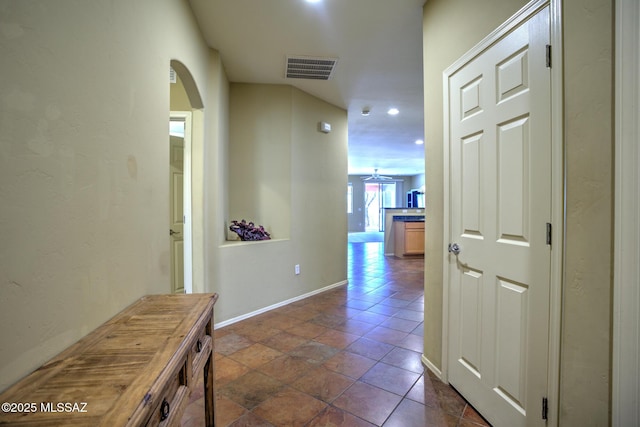 11113 N Rams Horn Trl N, Oro Valley, AZ 85737 - hall featuring arched walkways, recessed lighting, and baseboards