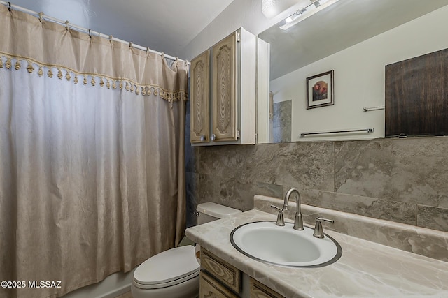 6158 E Calle Aurora, Tucson, AZ 85711 - full bathroom featuring tasteful backsplash, toilet, vanity, and shower / bath combo with shower curtain