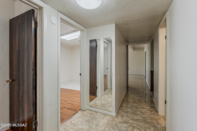 6158 E Calle Aurora, Tucson, AZ 85711 - hall featuring a textured ceiling