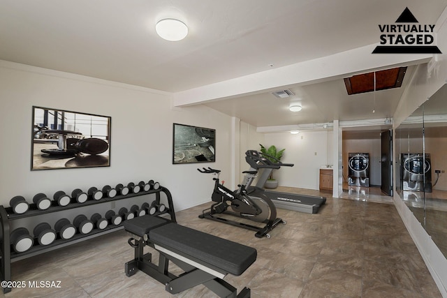 6158 E Calle Aurora, Tucson, AZ 85711 - exercise room featuring washer and dryer