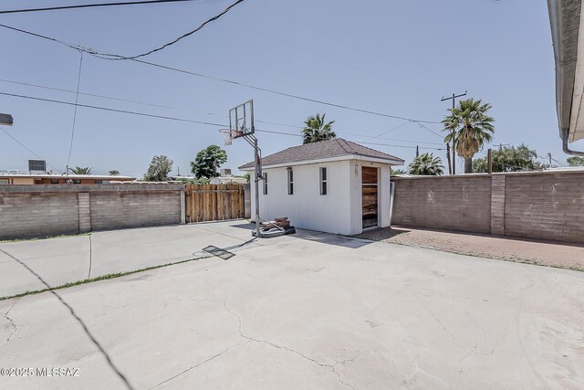6158 E Calle Aurora, Tucson, AZ 85711 - view of patio featuring a fenced backyard and an outdoor structure
