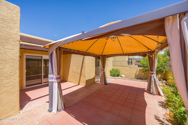 9846 E 2nd St, Tucson, AZ 85748 - view of patio with a gazebo and fence