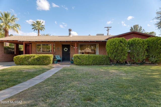 2826 E Kleindale Rd, Tucson, AZ 85716 - single story home featuring a front lawn and brick siding