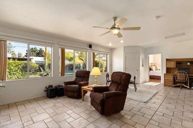 2826 E Kleindale Rd, Tucson, AZ 85716 - living area with ceiling fan and recessed lighting