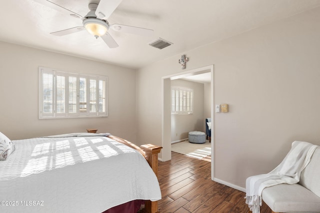 2826 E Kleindale Rd, Tucson, AZ 85716 - bedroom featuring wood finished floors, baseboards, and a ceiling fan