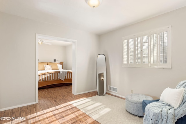 2826 E Kleindale Rd, Tucson, AZ 85716 - bedroom featuring baseboards and wood finished floors