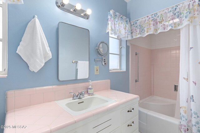 2826 E Kleindale Rd, Tucson, AZ 85716 - bathroom with shower / bath combo with shower curtain and vanity