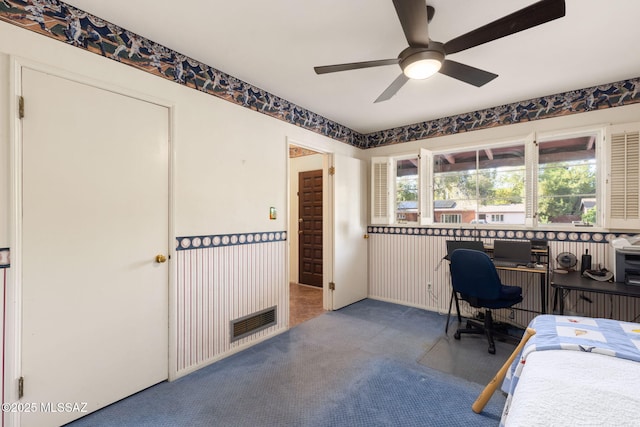 2826 E Kleindale Rd, Tucson, AZ 85716 - carpeted bedroom with an office area and ceiling fan