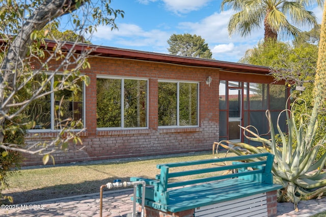 2826 E Kleindale Rd, Tucson, AZ 85716 - rear view of house with brick siding