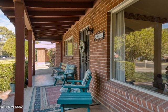 2826 E Kleindale Rd, Tucson, AZ 85716 - view of patio featuring a porch