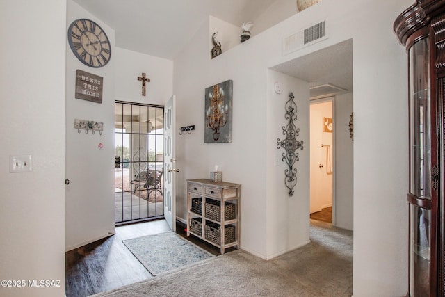 10095 E Autumnwind Pl, Tucson, AZ 85730 - foyer entrance featuring high vaulted ceiling and baseboards