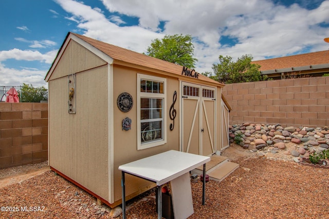 10095 E Autumnwind Pl, Tucson, AZ 85730 - view of shed featuring a fenced backyard