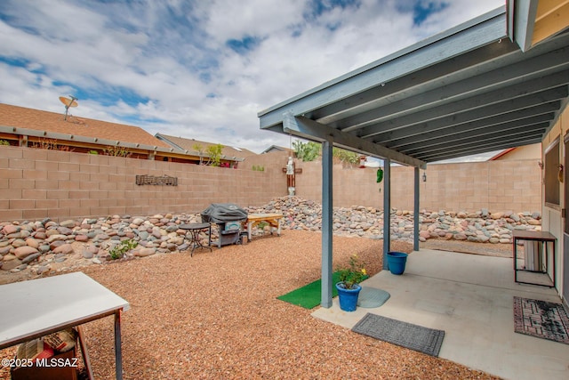10095 E Autumnwind Pl, Tucson, AZ 85730 - view of patio featuring a fenced backyard and area for grilling