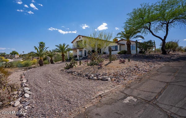 1861 N Camino Claveles, Tucson, AZ 85745 - view of front facade with a balcony