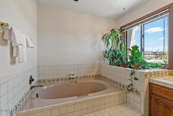 1861 N Camino Claveles, Tucson, AZ 85745 - full bathroom with a garden tub and vanity