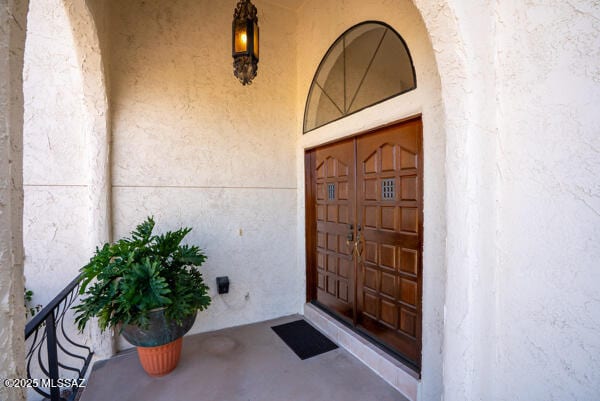1861 N Camino Claveles, Tucson, AZ 85745 - property entrance with stucco siding
