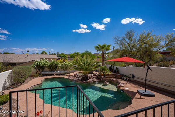 1861 N Camino Claveles, Tucson, AZ 85745 - view of swimming pool with a fenced backyard and a patio