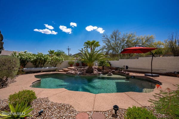1861 N Camino Claveles, Tucson, AZ 85745 - view of pool featuring a patio and a fenced backyard