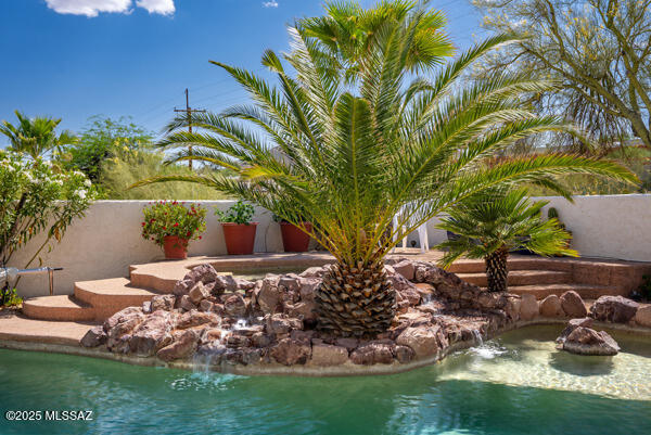 1861 N Camino Claveles, Tucson, AZ 85745 - view of swimming pool featuring fence