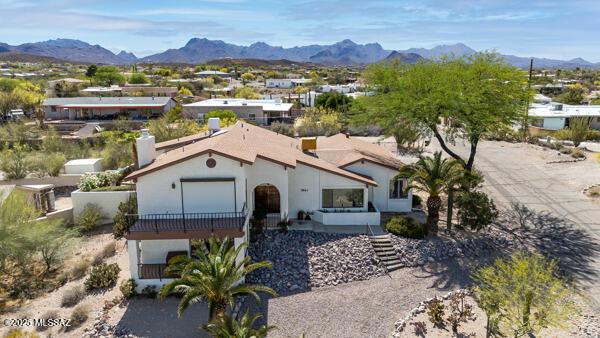 1861 N Camino Claveles, Tucson, AZ 85745 - mediterranean / spanish-style house with a mountain view and stucco siding