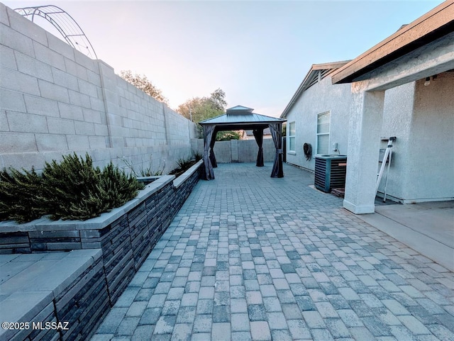 3756 W Exton Ln, Tucson, AZ 85746 - fenced backyard with a patio and a gazebo