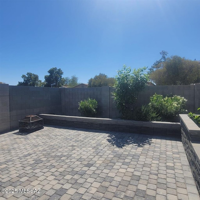 3756 W Exton Ln, Tucson, AZ 85746 - fenced backyard with a patio area