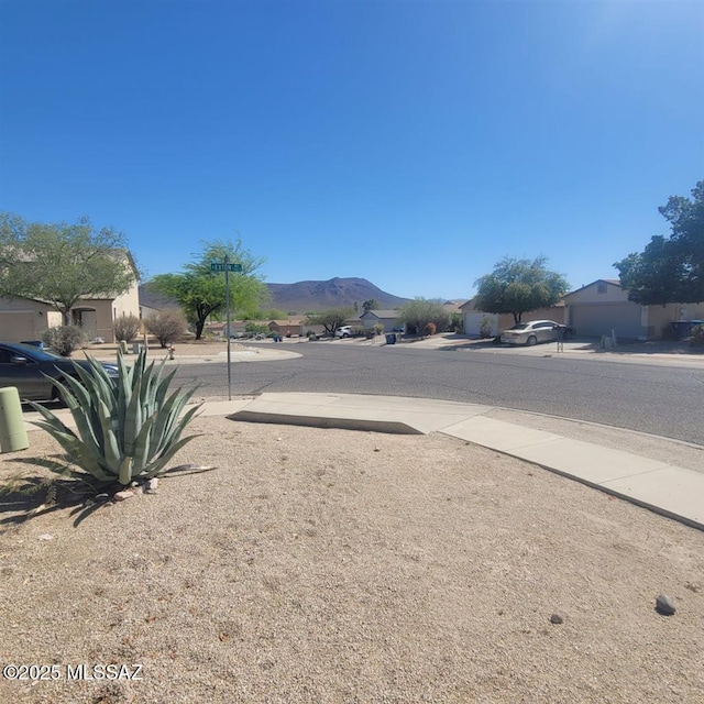 3756 W Exton Ln, Tucson, AZ 85746 - view of asphalt street with sidewalks and a mountain view