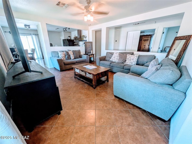 3756 W Exton Ln, Tucson, AZ 85746 - living area with tile patterned flooring and ceiling fan