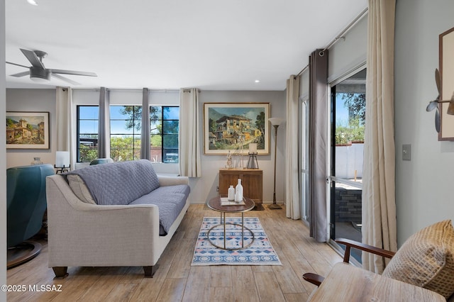 210 S Abrego Dr, Green Valley, AZ 85614 - living room featuring plenty of natural light, ceiling fan, light wood-type flooring, and recessed lighting