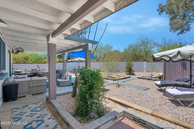 210 S Abrego Dr, Green Valley, AZ 85614 - fenced backyard with a patio area and outdoor lounge area