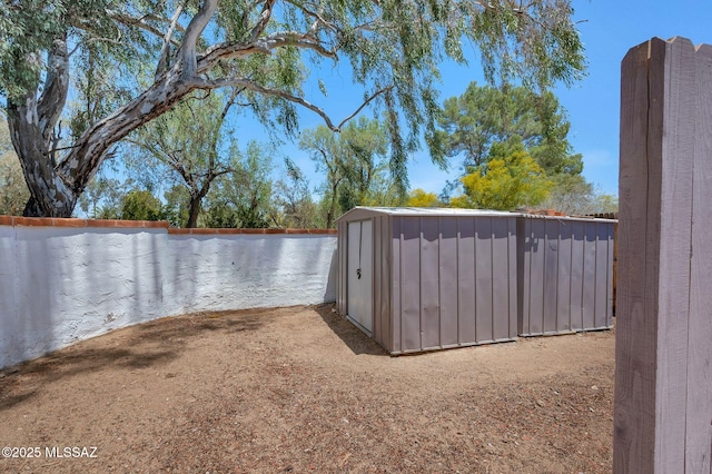 210 S Abrego Dr, Green Valley, AZ 85614 - view of yard featuring a storage unit and an outdoor structure