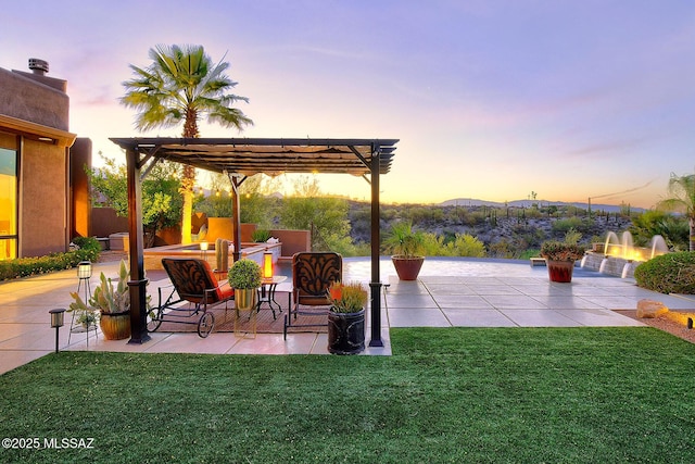 view of patio / terrace with a pergola