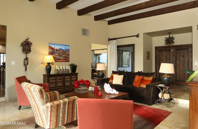 9971 N Desert Sky Rd, Oro Valley, AZ 85737 - living area with beamed ceiling, tile patterned floors, and a towering ceiling