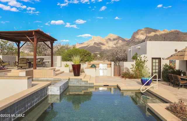 9971 N Desert Sky Rd, Oro Valley, AZ 85737 - view of swimming pool featuring area for grilling, a mountain view, a patio, and fence