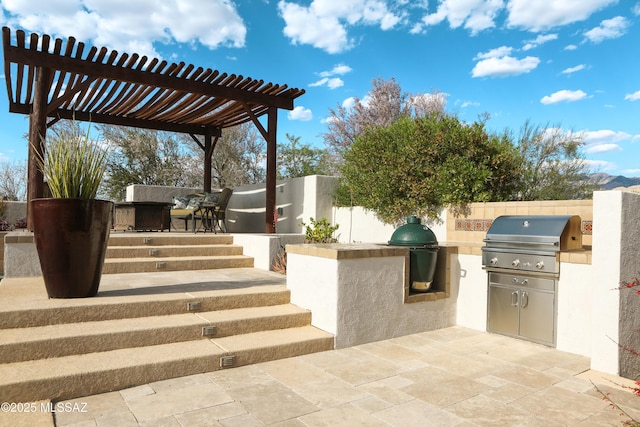 9971 N Desert Sky Rd, Oro Valley, AZ 85737 - view of patio / terrace with an outdoor kitchen, grilling area, a pergola, and fence