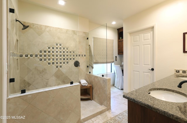 9971 N Desert Sky Rd, Oro Valley, AZ 85737 - bathroom featuring walk in shower, double vanity, and recessed lighting