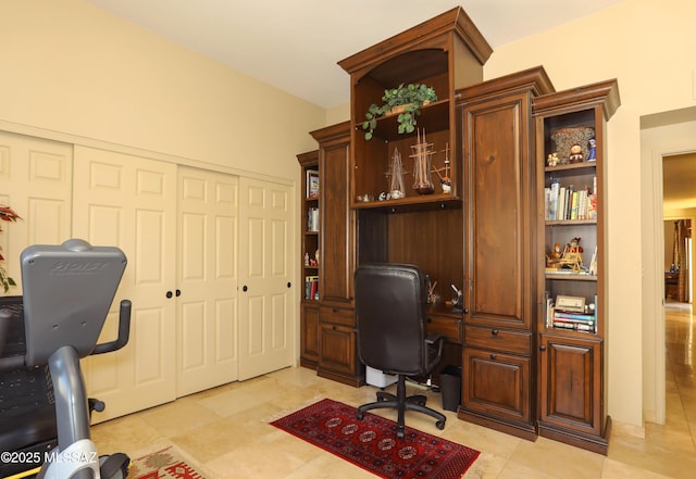 9971 N Desert Sky Rd, Oro Valley, AZ 85737 - home office featuring light tile patterned floors and built in desk