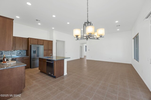 62742 E Oakwood Dr, Saddlebrooke, AZ 85739 - kitchen featuring high quality fridge, dishwasher, a chandelier, recessed lighting, and backsplash