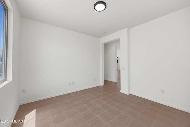 62742 E Oakwood Dr, Saddlebrooke, AZ 85739 - spare room with baseboards