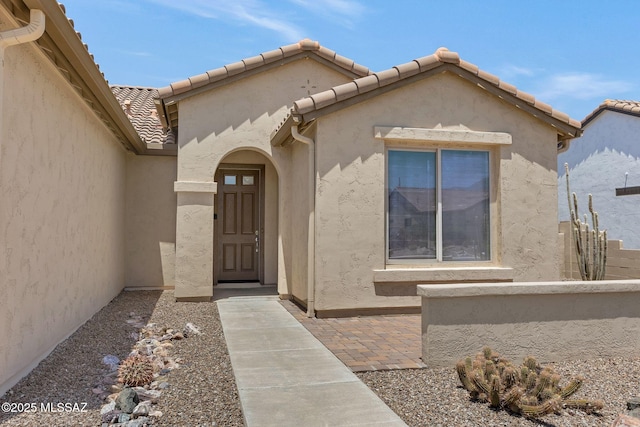 62742 E Oakwood Dr, Saddlebrooke, AZ 85739 - entrance to property featuring stucco siding and a tiled roof