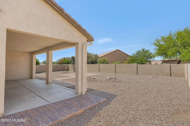 62742 E Oakwood Dr, Saddlebrooke, AZ 85739 - fenced backyard featuring a patio